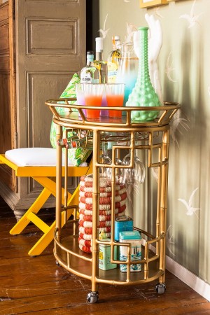 Colorful serving pieces add to the bar cart 
