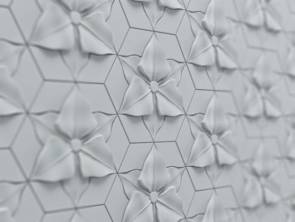 A close up image of a white tiled wall, bringing your walls alive with 3D panels.