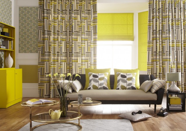 A living room with yellow and grey curtains, getting graphic with your interiors.