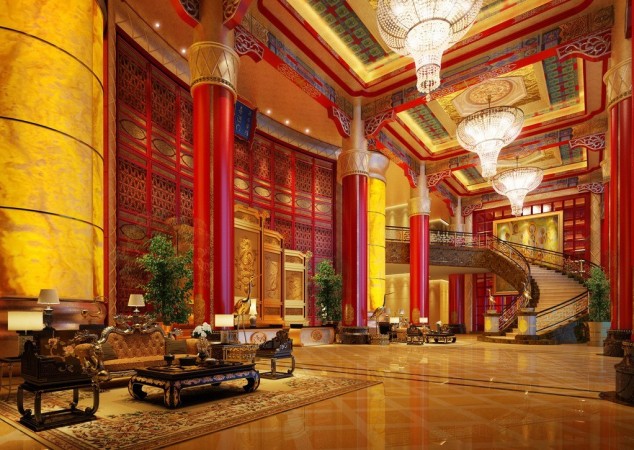 The lobby of a Chinese hotel is decorated in red and gold, teaching us about interior design.