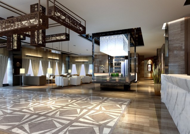 A modern hotel lobby with a luxurious marble floor and an elegant chandelier.