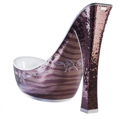A high heeled shoe with sequins on it.