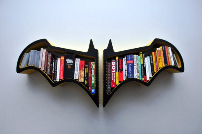 creative bookcase shaped like a bat