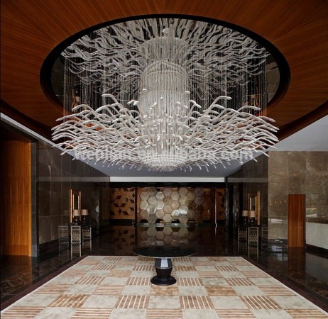 A chandelier in a hotel lobby.
