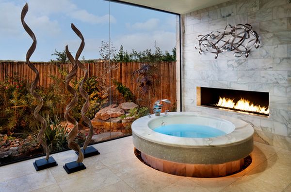 amazing bathroom with a modern fireplace