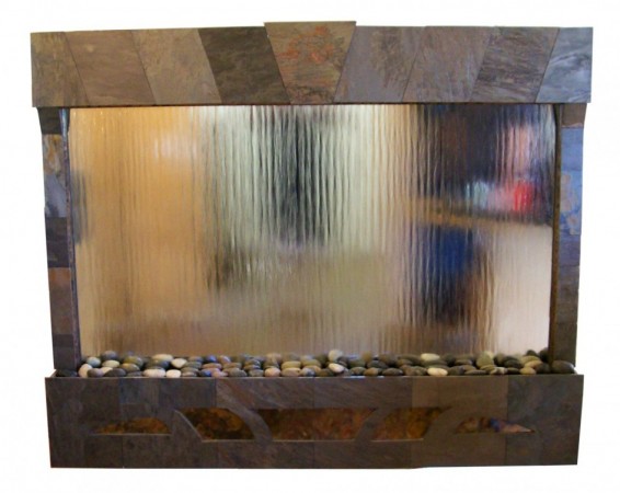 beautiful water wall made with stones, wood and glass