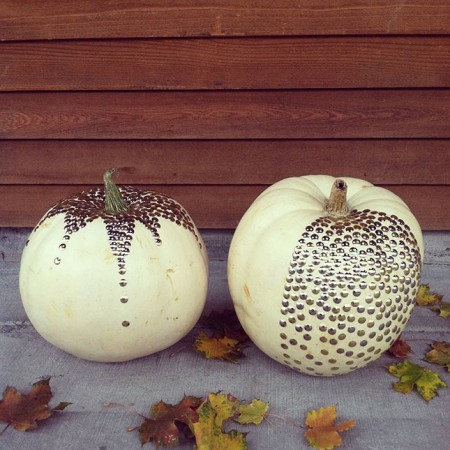 Two white pumpkins custom painted with polka dots from Michaels.