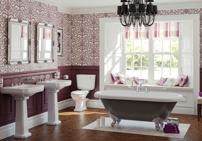 An elegant bathroom featuring a clawfoot bathtub with a window.