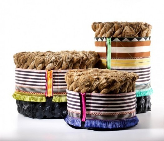 A group of baskets with different colored ribbons on them.