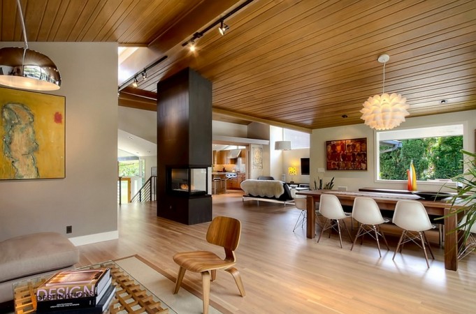 A Mid-Century Modern living room with wooden ceilings.