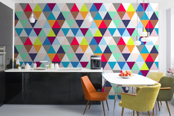 A kitchen with colorful triangles on the wall, getting graphic with your interiors.