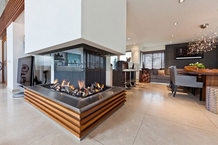 A modern living room with open fireplace designs.