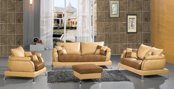 A versatile living room with brown leather furniture.