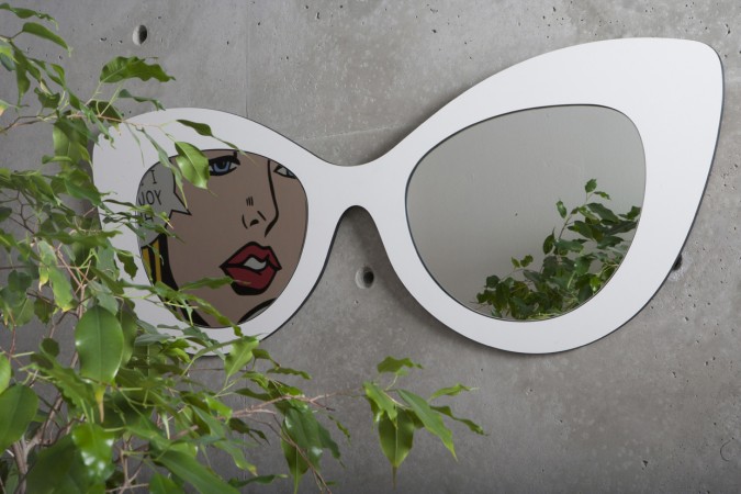 funny mirror shaped as a pair of glasses