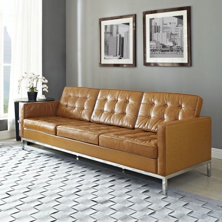 A tan leather sofa showcasing the allure of leather seating.