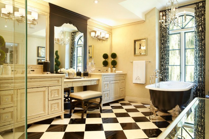 A bathroom with a black and white checkered floor showcasing the elegance of the clawfoot bathtub.