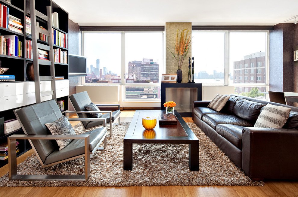 A living room showcasing the allure of a brown leather couch.