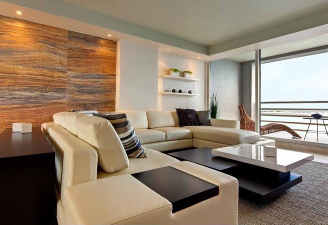 A modern living room with leather seating.