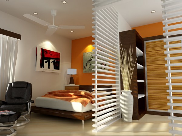 A room with a bed and a chair featuring striped accents.