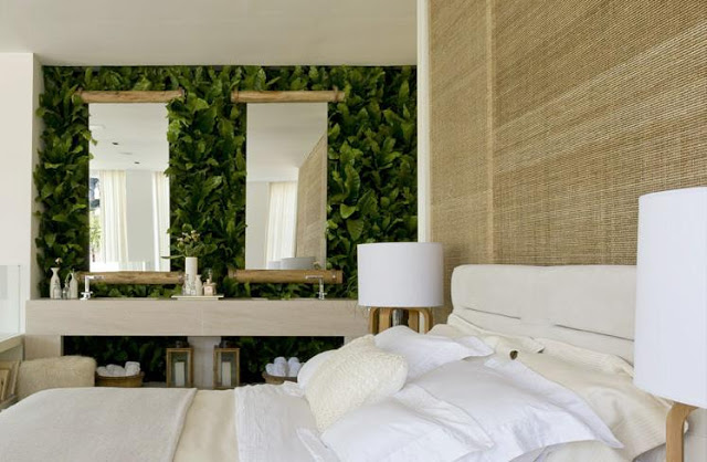 modern bedroom decorated with plants on the wall