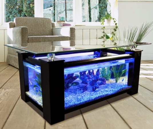 A coffee table with an aquarium.