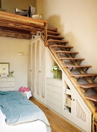 Keywords: Bedroom, Staircase

Modified description: A mesmerising bedroom with a bed ingeniously placed beneath a staircase.