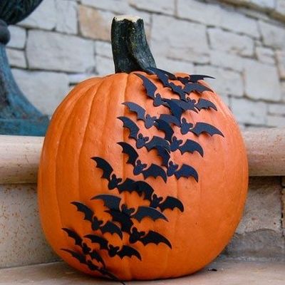 A custom pumpkin with bats painted on it by Michaels.