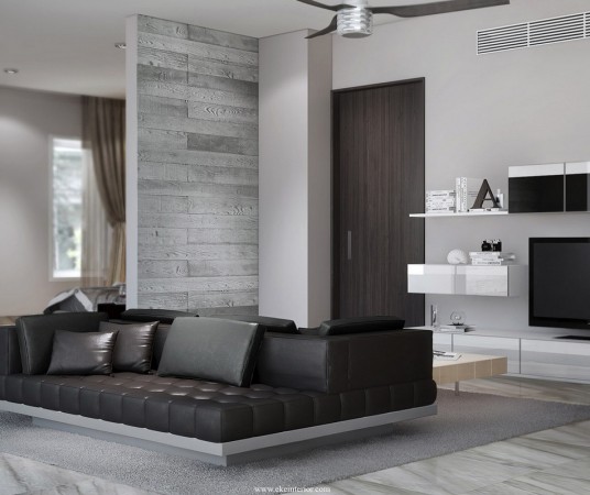 A modern living room with versatile and alluring black and white leather furniture.