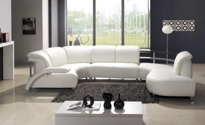 The Allure of a white leather sectional sofa in a modern living room.