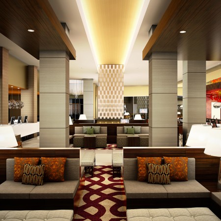 6 Ways Hotel Lobbies Teach us About Interior Design - An image of a hotel lobby with couches and chairs.