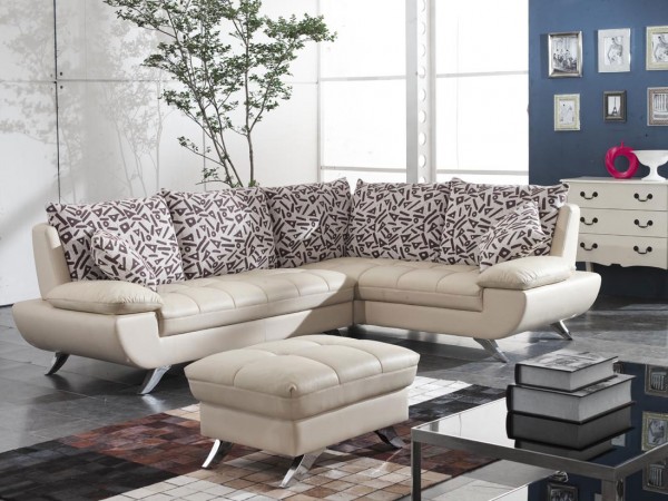 A versatile living room featuring a sectional sofa and ottoman with leather seating.