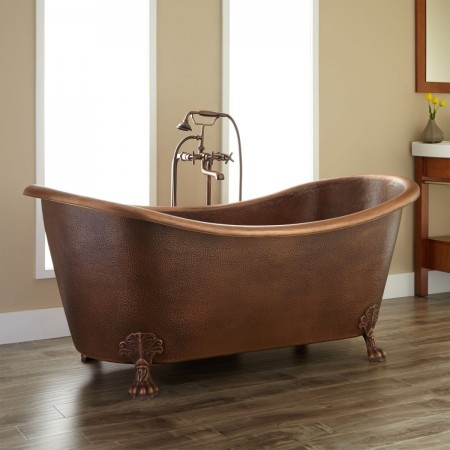 Copper clawfoot tub adds vintage elegance to any bathroom