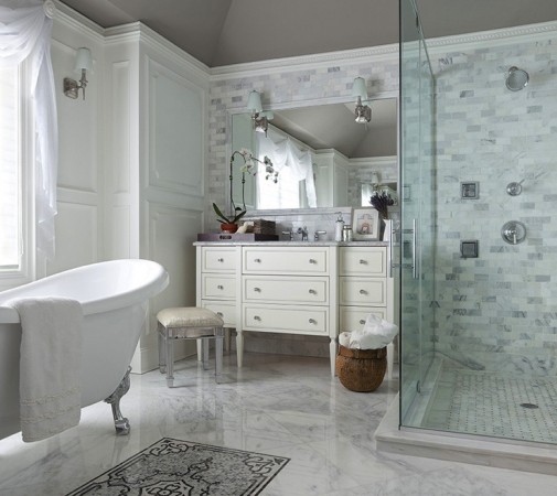 A white bathroom with a bathtub featuring the elegance and charm of the clawfoot design.
