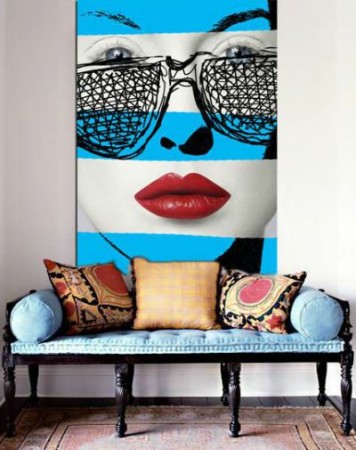 A pop art painting of a woman wearing sunglasses.