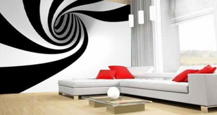 An optical art spiral wall mural in a living room.