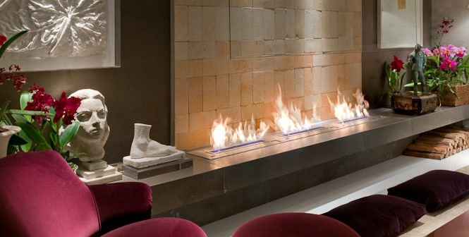 the newer fireplaces need less space and don't make smoke