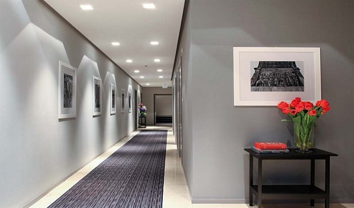 the use of multiple lights on the ceiling is the best choice to illuminate narrow places such as an hallway