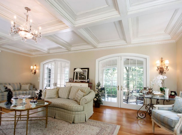 High coffered ceiling adds a beautiful element to this home
