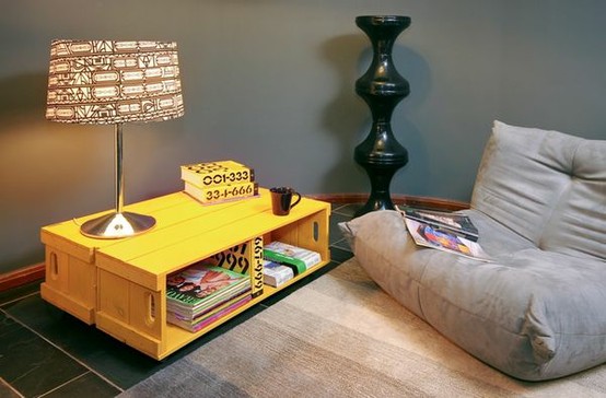 A living room with a yellow coffee table and a lamp. (No changes made.