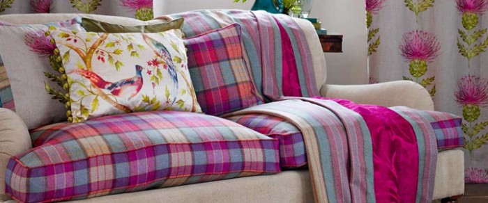 Snuggle up with a plaid sofa in your home.