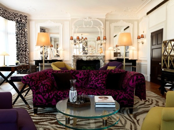 A Haute Couture living room with zebra print furniture.