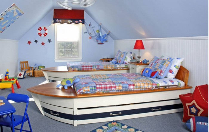 A kids room with bunk beds and a toy boat.