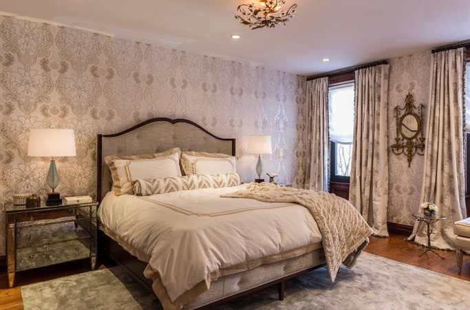 A soft color palette enhances this feminine bedroom 