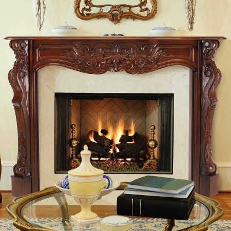 Carved wood mantel dresses up the fireplace