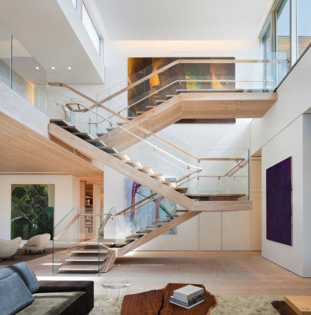 Beautiful modern staircase leads to open second floor 