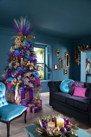An alternative living room with a purple and blue Christmas tree.