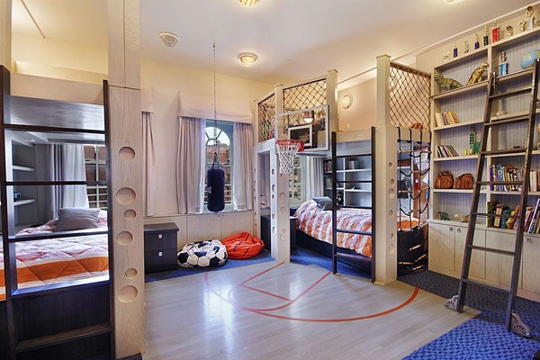 A kids' room with bunk beds and a basketball court.