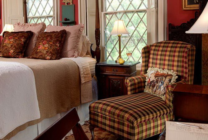Snuggle Up With Plaid in Your Red-Walled Bedroom