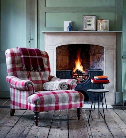 Snuggle up with plaid in front of a fireplace.