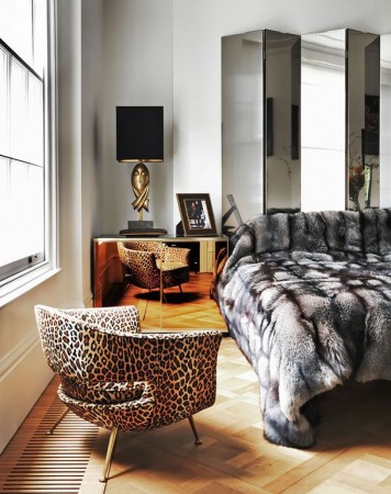 Fur blanket and animal print chair add softness, luxury and texture 